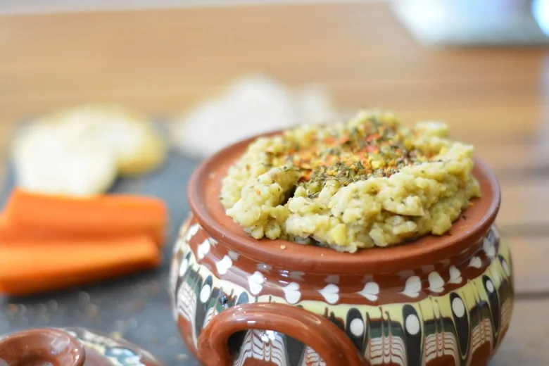 Maltese Bigilla dip topped with herbs and chili flakes
