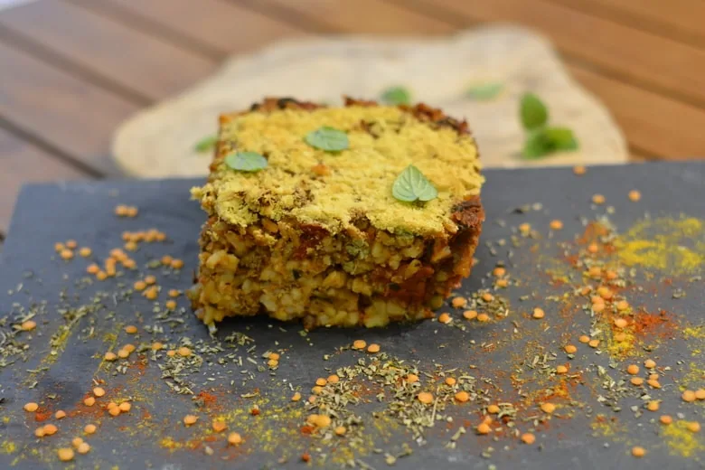 Vegan Maltese baked rice topped with nutritional yeast