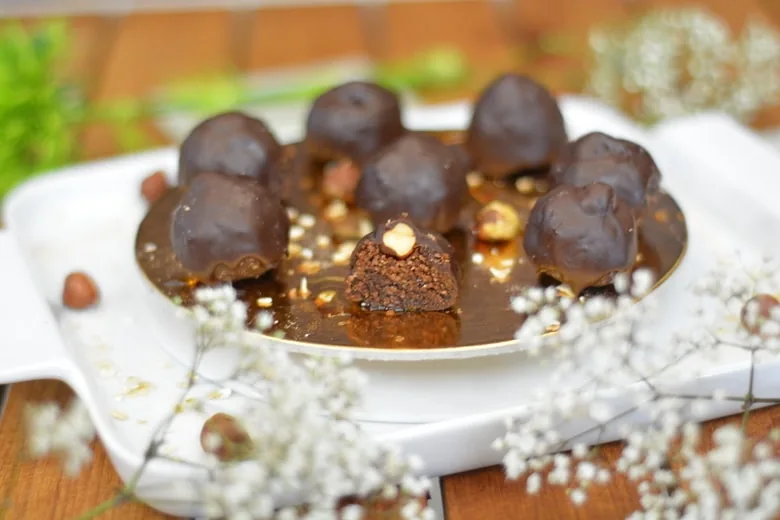 A healthy vegan baci ball halved