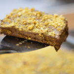 A slice of vegan Gateau Marie, also known as mama's cake or coffee gateau